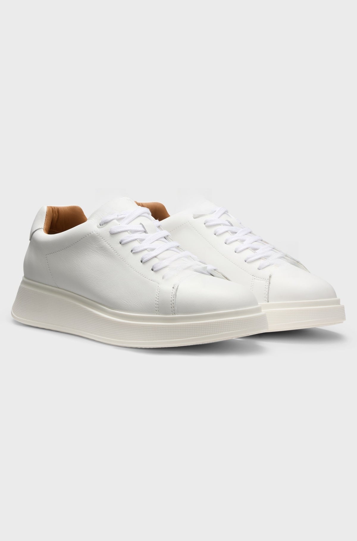 Clean white lace-up leather trainers, made in Portugal - White